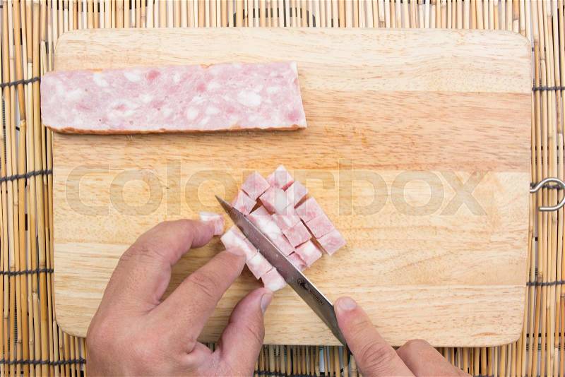 Chef cutting bacon for cooking fired rice / cooking fire rice concept, stock photo