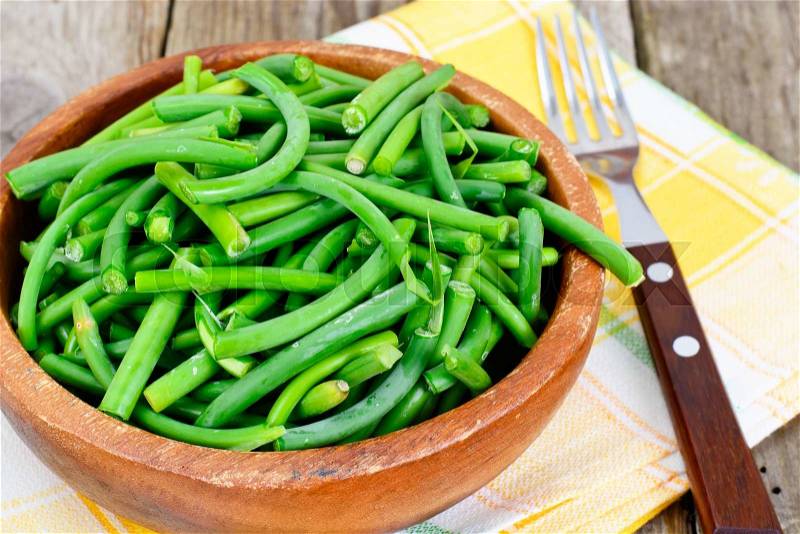 Green Beans in Wooden Bowl. Studio Photo, stock photo