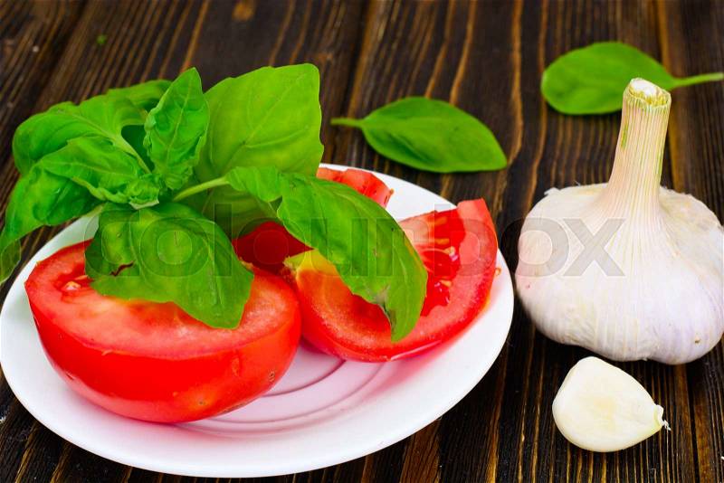 Tomato and Basil. National Italian Cuisine. Studio Photo, stock photo