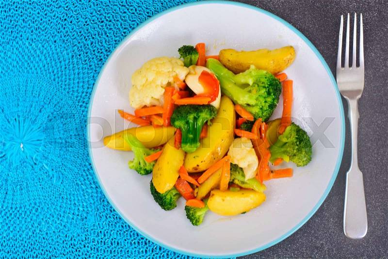 Steamed Vegetables Potatoes, Carrots, Cauliflower, Broccoli Studio Photo, stock photo