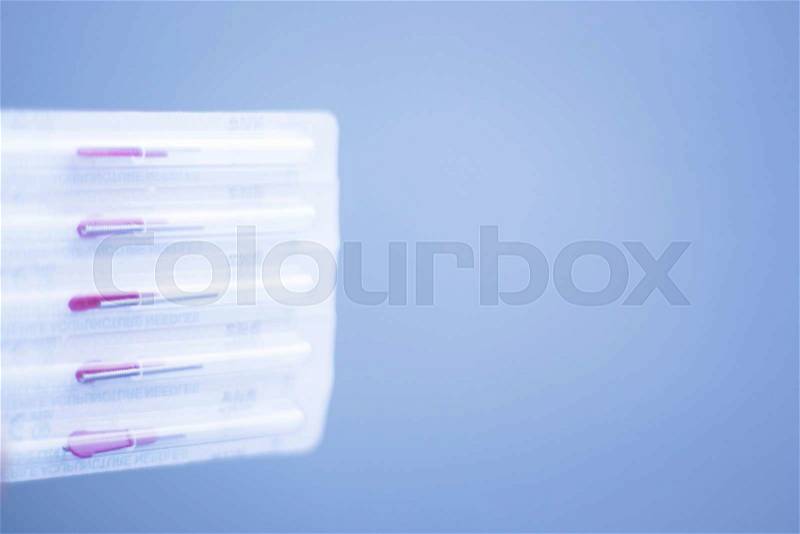 Dry needling acupunture needles for physical therapy patient treatment, stock photo