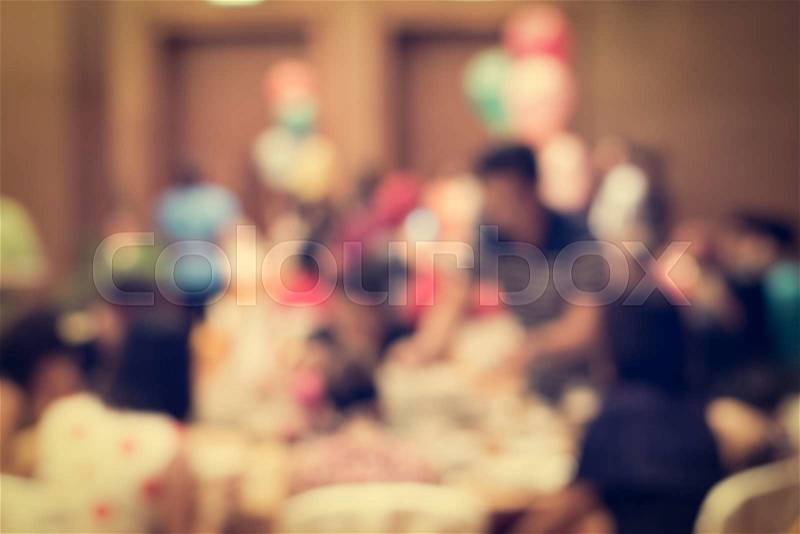 Blurred people in the banquet room with colorful balloon, stock photo