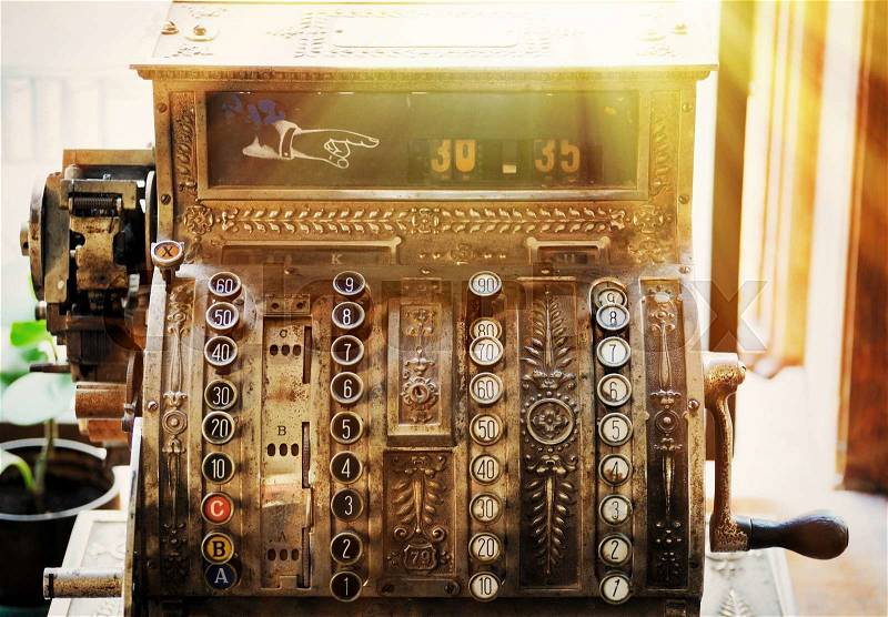 Vintage cash register in an old pharmacy, stock photo
