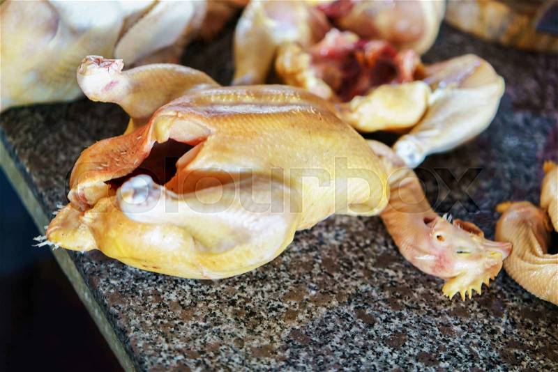 Selling Drawn chicken in the street market in Hoi An, Vietnam, stock photo