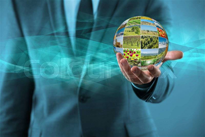 Man holding earth with nature photos, stock photo
