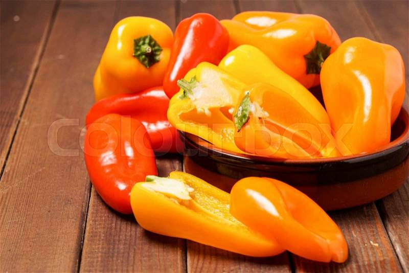 Small bell peppers in red and orange, stock photo