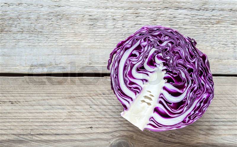 Red cabbage on the wooden background, stock photo