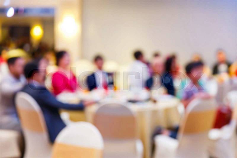 Abstract blur people in restaurant or food center with light bokeh background, party lifestyle, stock photo