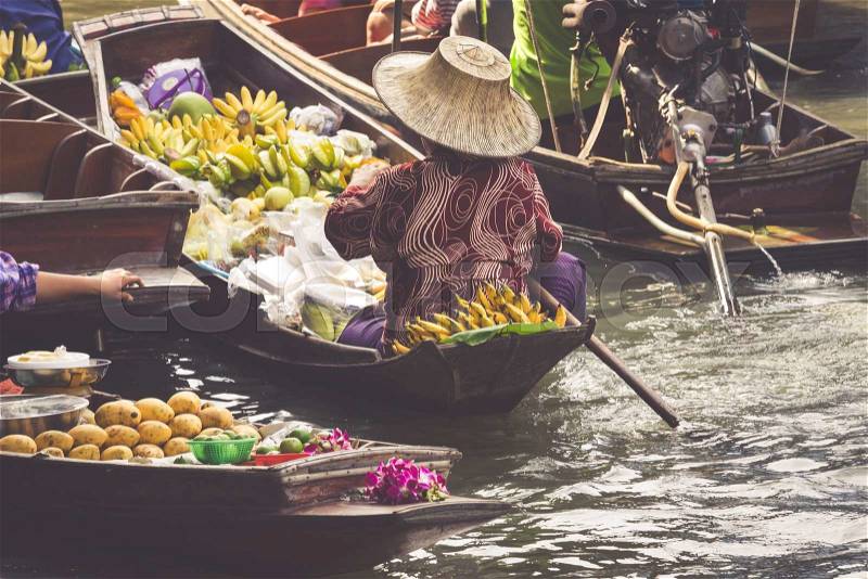 Traditional floating market in Damnoen Saduak near Bangkok, stock photo
