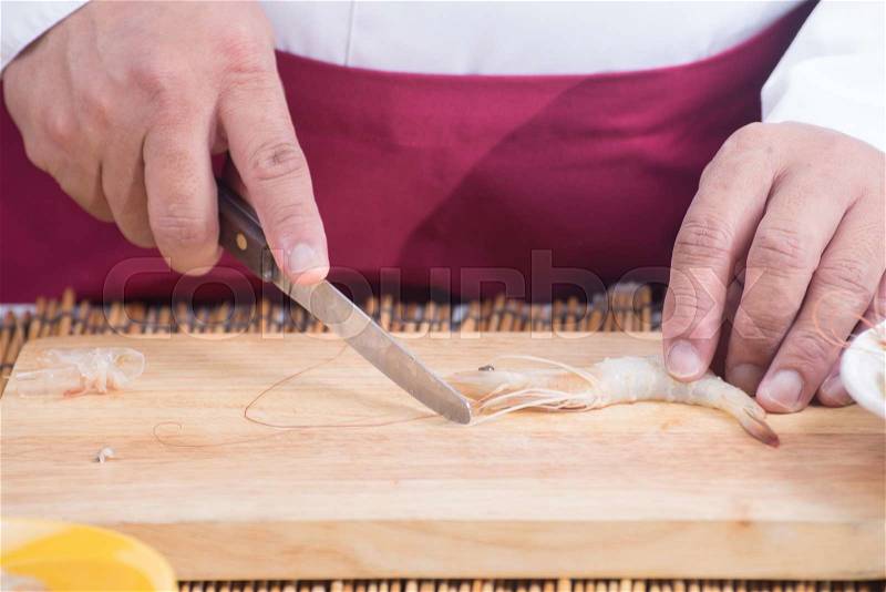 Chef prepared shrimp before cooking / Cooking Pad Thai concept, stock photo