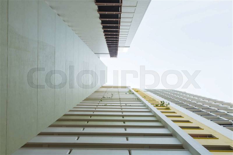 Look up a skyscraper. There are multi-layered and multi-room spaces, stock photo