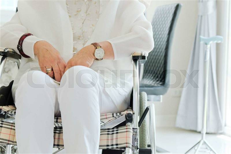 Elderly woman in wheelchair, stock photo