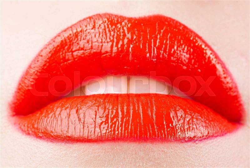 Closeup of beautiful sexy plump woman lips with lipstick, stock photo
