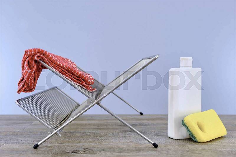A studio photo of a dish rack, stock photo