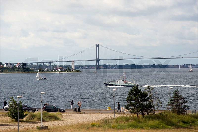 Harbor view from Fredericia - Strib lighthouse and bridge in background, stock photo