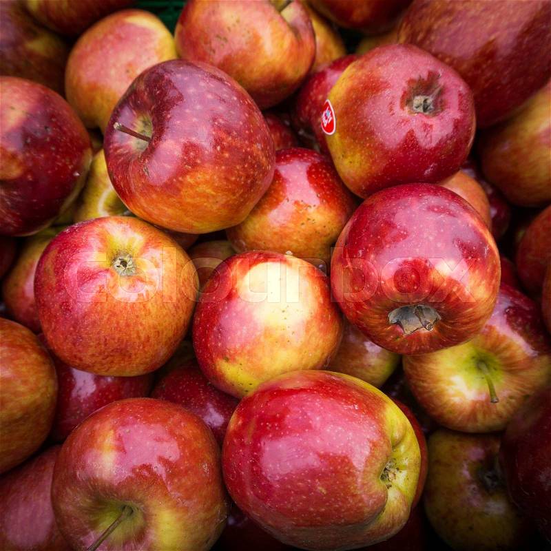 Apples close up at market. Red apples background, stock photo