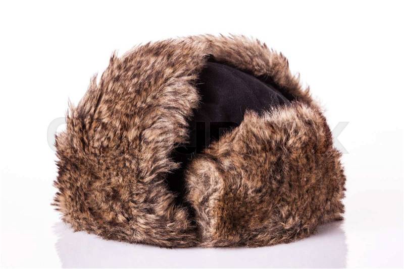Fur cap for winter weather. Fur cap for winter isolated on white background, stock photo