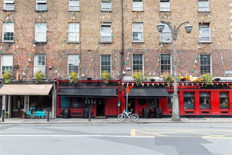 Architecture concept - building with bar or pub on street of Dublin city, stock photo