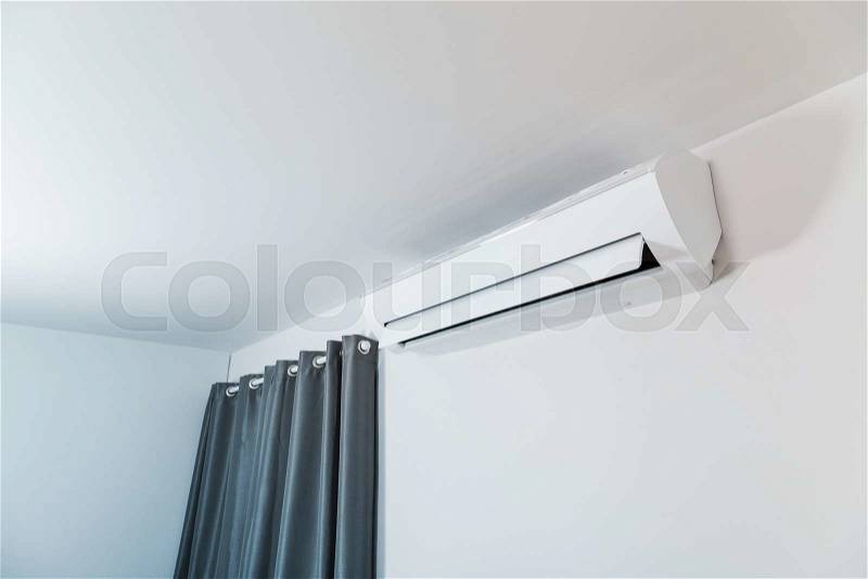 Air conditioner on wall background, stock photo