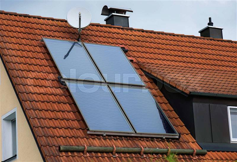 Solar panels on the red house roof. Close up photo, stock photo