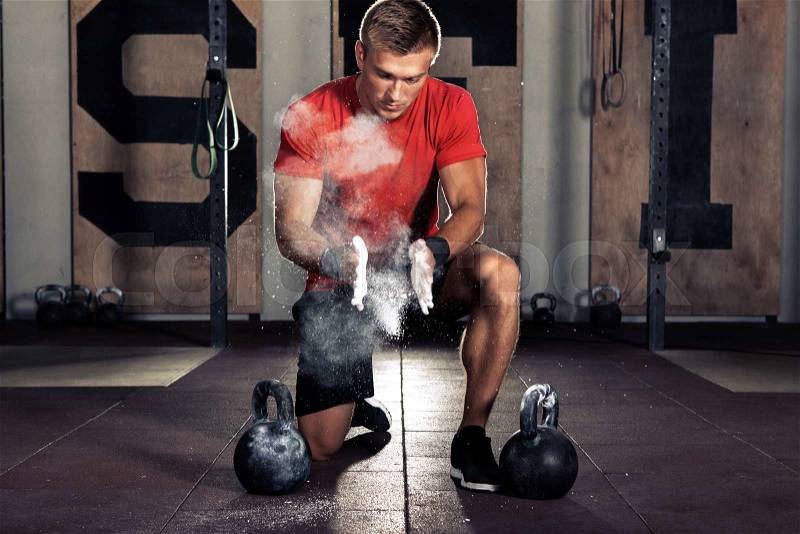 Young athlete getting ready for crossfit training, stock photo