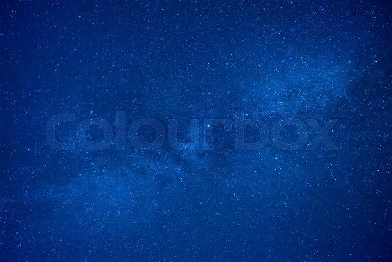 Blue dark night sky with many stars. Space milky way background, stock photo