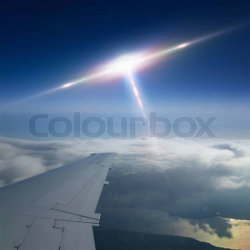 Abstract scientific background - flying craft piloted by aliens approaches to aircraft, ufo flies near airplane, stock photo