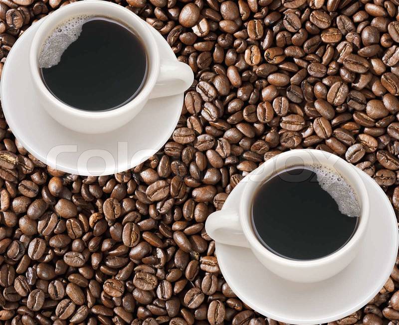 Coffee cups with coffee beans, stock photo