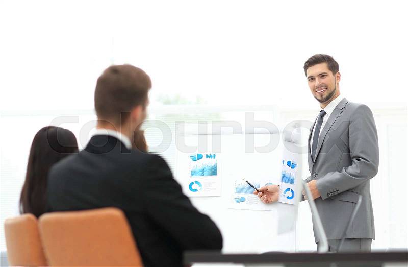 Successful business presentation of a man at the office, stock photo