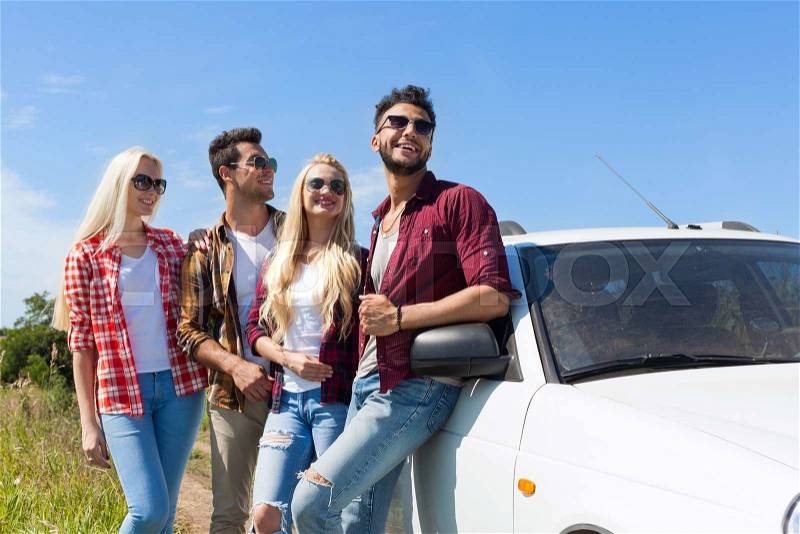 People group looking side copy space blue sky standing near car outdoor countryside two couple summer day holiday trip, stock photo