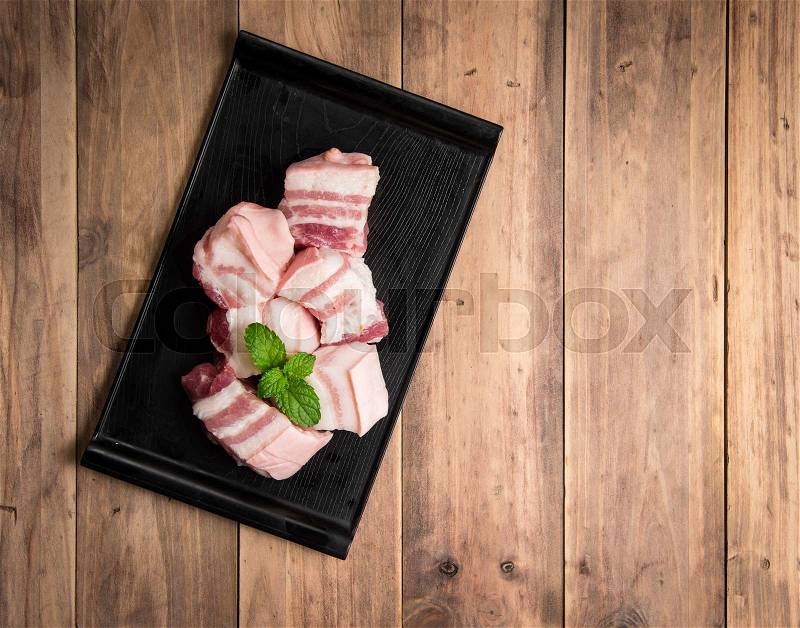 Pork on wood background,Pork belly, stock photo