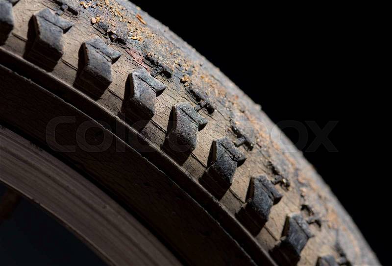 Bike tire pattern on dark background,Selective focus with shallow depth of field, stock photo