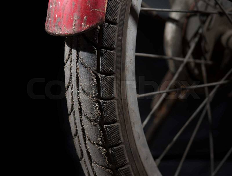 Bike tire pattern on dark background,Selective focus with shallow depth of field, stock photo