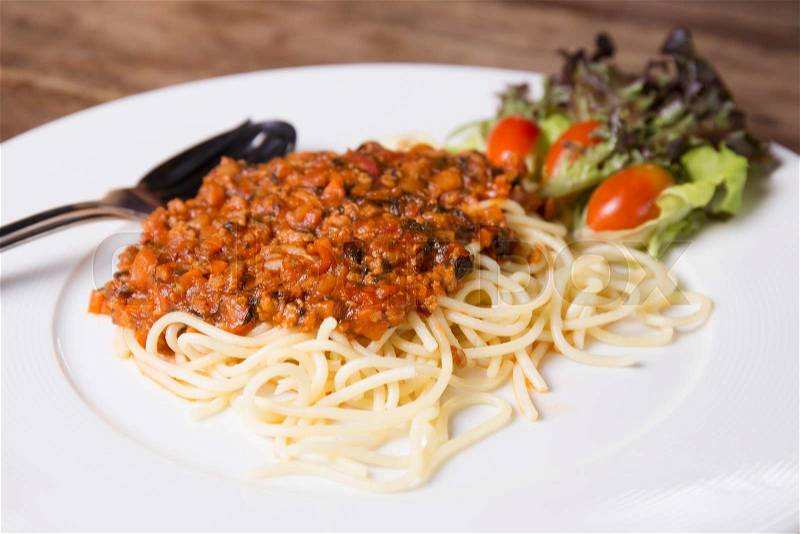 Spaghetti with meat sauce on the table , stock photo