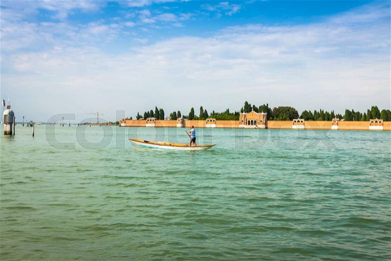 The man on the boat Venice, Italy, stock photo