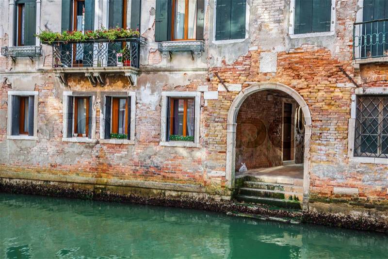 Venetian buildings and boats along Canal Grande, Venice, italy, stock photo