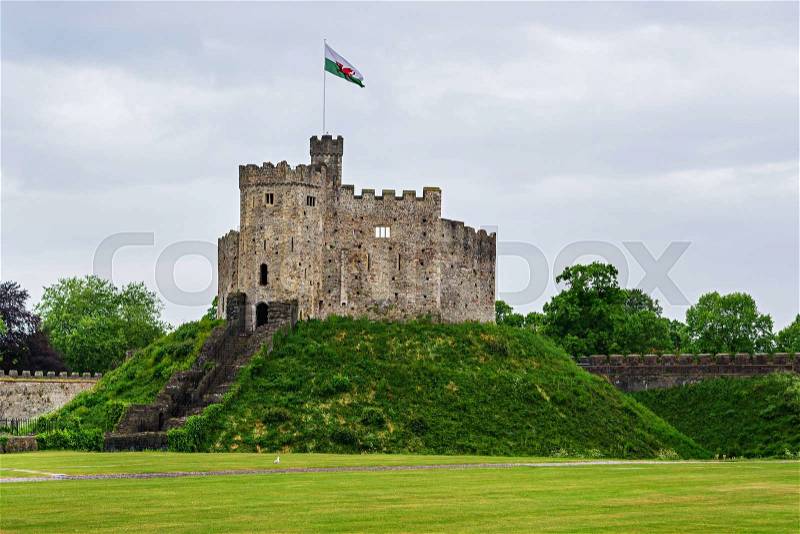 Watch Tower with a flag of Cardiff Castle in Cardiff in Wales of the United Kingdom. Cardiff is the capital of Wales. , stock photo