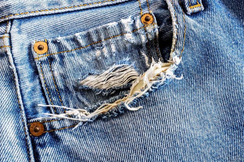 Grunge denim pocket closeup. texture background of jeans and pockets, stock photo