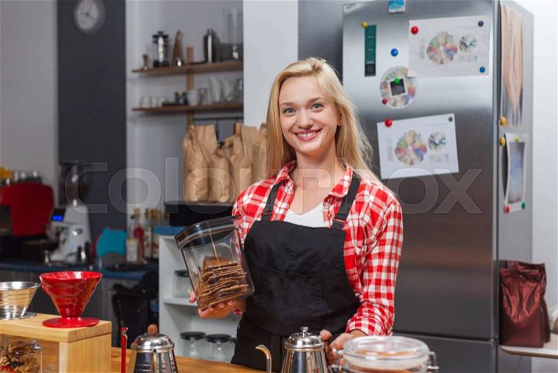 Barista coffee shop owner woman happy smile at bar counter small business, stock photo