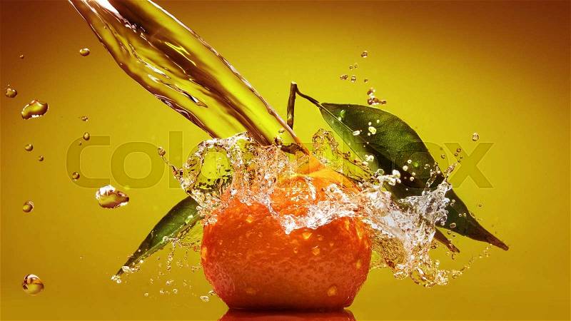 Tangerine with green leaves and water splash on green background. Header for website, stock photo