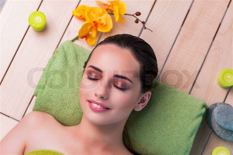 Young beautiful woman during spa procedure