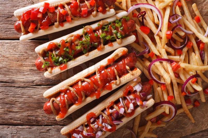 Takeaway: hot dogs and french fries on the table. Horizontal view from above , stock photo