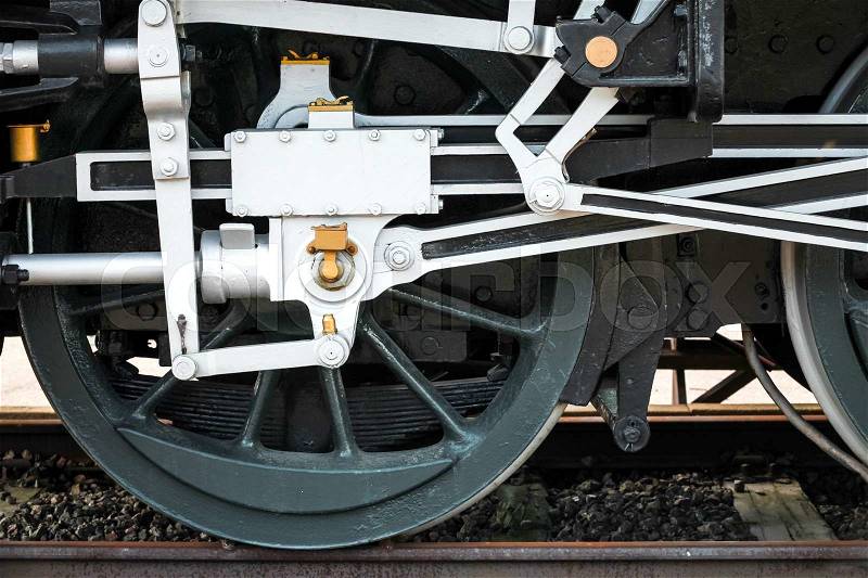 Wheels of steam locomotive with the power parts, stock photo
