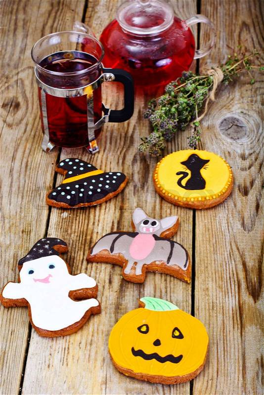 Gingerbread for Halloween with Red Tea. Funny Holiday Food for Children.Studio Photo, stock photo