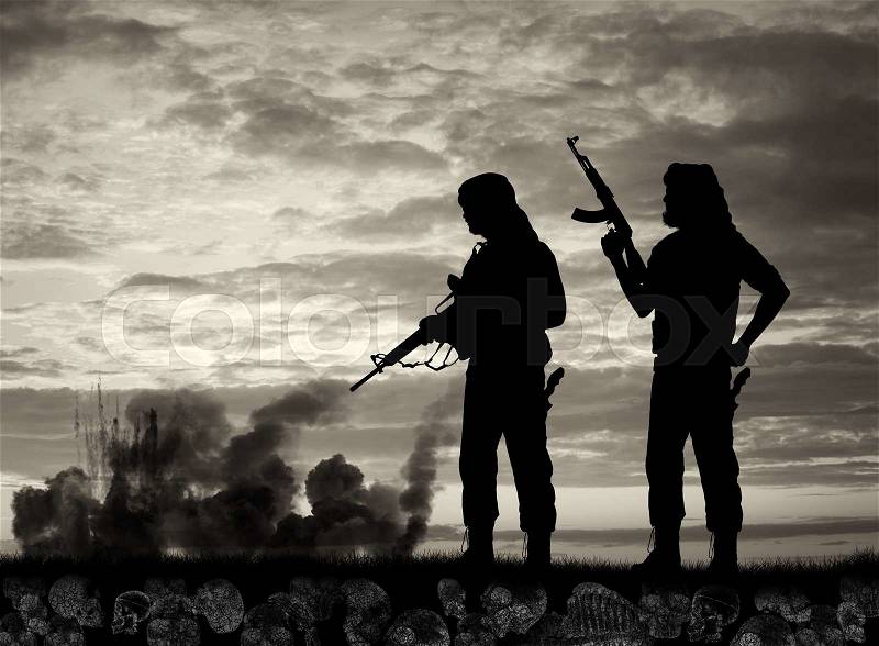 Terrorism and conflict. Skulls and bones underfoot two terrorists on the background of explosions and smoke, stock photo
