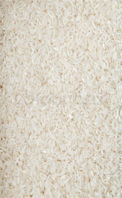 White long rice natural white long rice grains background, closeup, stock photo