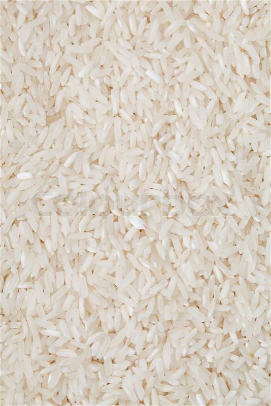 White long rice natural white long rice grains background, closeup, stock photo