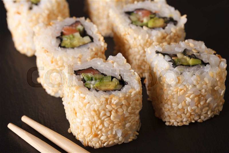 Tasty Sushi California Rolls closeup. Horizontal , stock photo