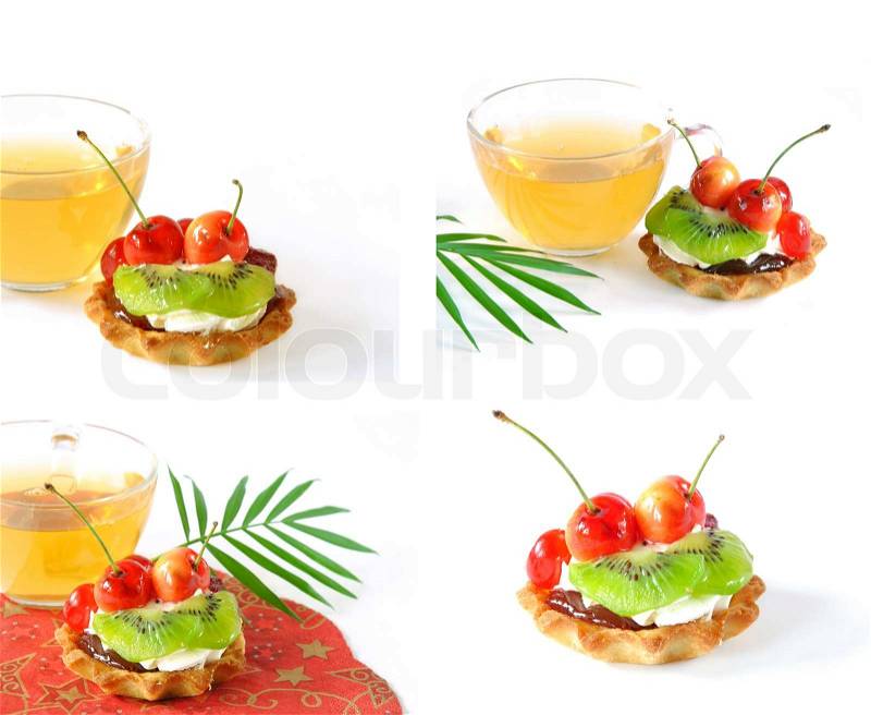 Fruit cake and cup of green tea on a white background, stock photo