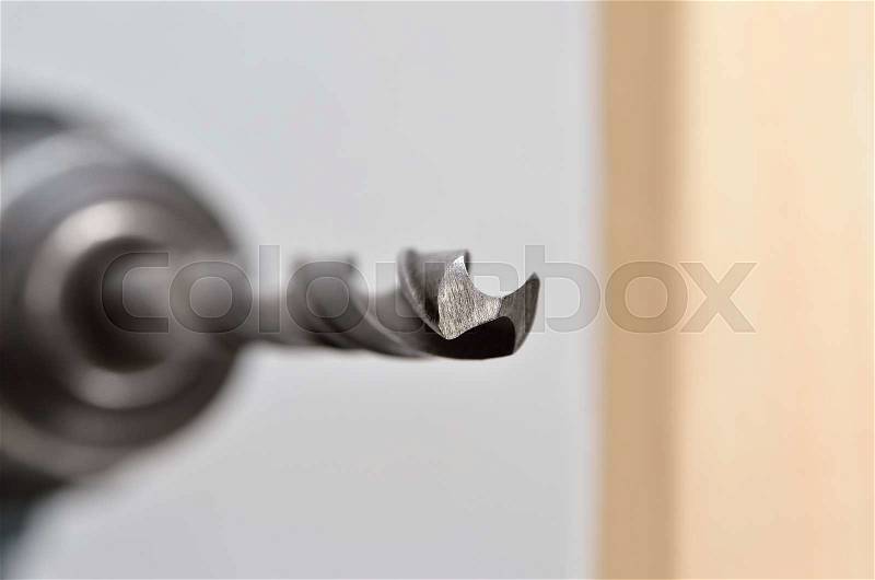 Steel plumbing drill. Variety of tools and instruments close-up. Joinery work, stock photo